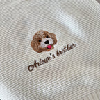 Cream knitted blanket with embroidered dog portrait