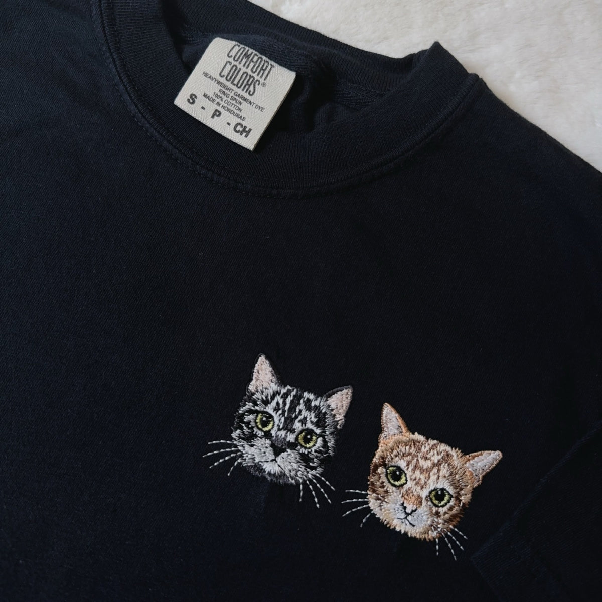 Black custom pet portrait t-shirt with two embroidered cats
